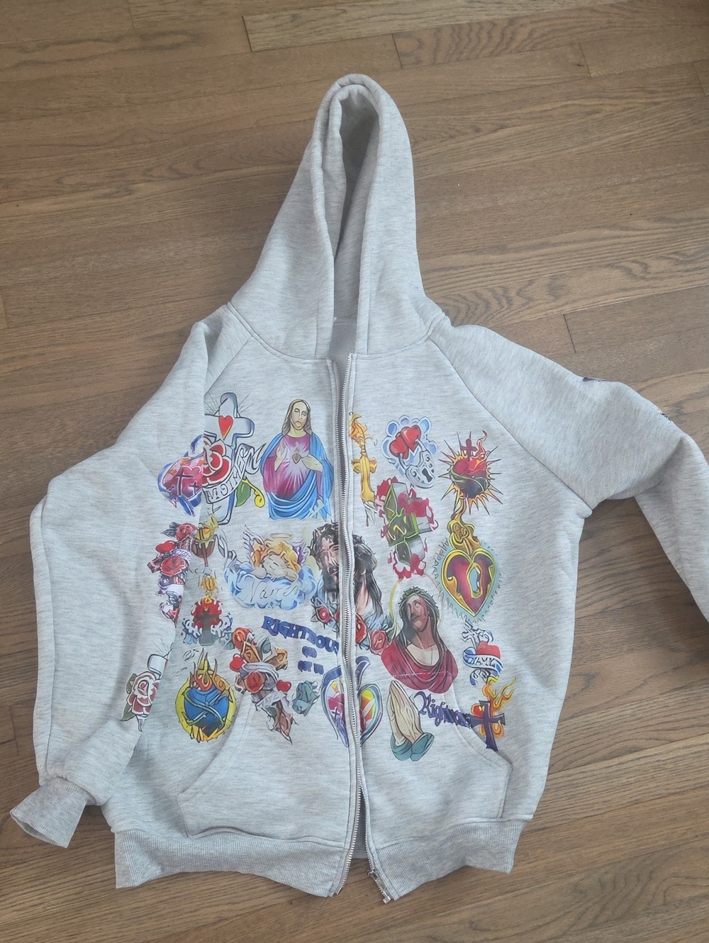 Graphic Zip-Up Hoodie with Colorful Religious and Tattoo Art